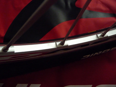 Picture of Fulcrum Red Metal Zero (Rim Brake) rim showing machining between spokes