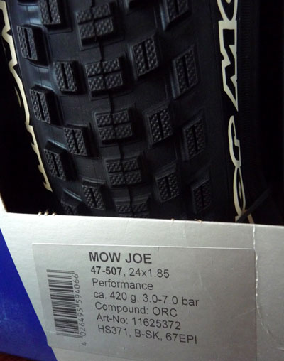 Picture of Schwalbe Moe Joe in retail box showing retail label, weight and tread pattern