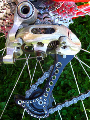 Close-up of tuned XT rear derailleur with 15g of excess aluminium removed